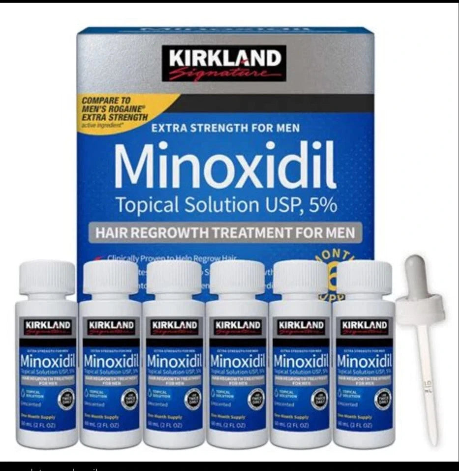 Kirkland Signature 5% Minoxidil Extra Strength 6 Month Supply for Men.
Close up of Kirkland 5% Minoxidil liquid bottles with dropper
Kirkland Minoxidil 5 percent extra strength topical solution
